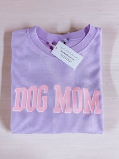 Dog Mom Corded Crewneck made by Royal Collections and Co. Dog Shirt Design, Diy Gifts To Sell, Pink Writing, Dog Obsessed, Dog Mommy, Trendy Hoodies, Mom Tees