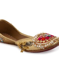 Gold juttis with intricate Goota work in vibrant colours tans peacock ghungroo embellishment and assure love at first sight! Double Cushioning for Extra Comfort Color: Gold and Orange Fabric: Upper: Leahrette Insole - Leather Sole - Vegetable tanned Leather Sole Note: Available in other colors The product will be shipped within 20-25 days of the order placed Any slight irregularities are distinctive and are inherent to the beauty of this creation as it is precisely crafted by hands. Care intruct Embellished Kundan Traditional Wear For Festivals, Traditional Flats With Mirror Work For Navratri, Traditional Embellished Party Flats, Festive Party Flats With Mirror Work, Embellished Flats For Party And Festivals, Festive Bollywood Flats With Gota Work, Zari Work Flats For Party And Festival, Bollywood Flats With Zari Work For Diwali, Bollywood Style Festive Flats With Gota Work