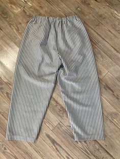 "One of a kind  pull on trousers  Size medium Waist 26\" unstretched Hips 42\" Rise 14\" Inseam 24\" Follow us on IG @inezandberyl" Striped Straight Leg Bottoms With Elastic Waistband, Spring Relaxed Fit Bottoms With Vertical Stripes, Casual Pinstripe Pants For Spring, Relaxed Fit Vertical Stripe Trousers, Casual Striped Trousers With Vertical Stripes, Relaxed Fit Trousers With Vertical Stripes, Casual Straight Leg Bottoms With Vertical Stripes, Casual Striped Tapered Leg Pants, Casual Pinstripe Pants With Relaxed Fit