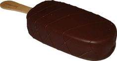 a piece of chocolate sitting on top of a wooden spatula