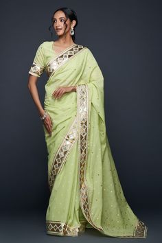 Pista green jamdani saree with gota applique embellishment in barfi and polka dots pattern. - Aza Fashions Pista Green Pre-draped Saree With Zari Work For Diwali, Designer Pista Green Chanderi Saree, Green Dola Silk Saree With Gota Work, Designer Chanderi Saree In Pista Green, Designer Pista Green Saree For Festivals, Pista Green Traditional Wear With Cutdana For Festivals, Green Lehenga With Dori Work For Puja, Festive Light Green Traditional Wear With Zari Work, Pista Green Chanderi Saree With Cutdana