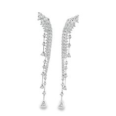 A great earring with a lot of versatility. Whether worn on a night out to dinner, a cocktail party, or dressed up for black tie, this earring is sure to shine and be the true star of the party. 18K White Gold White Diamonds: 5.24 ct All of our stones are untreated and natural which results in slight variances. Each creation is one-of-a-kind. All items are subject to availability. All products are made to order within 2-3 weeks. Luxury Sparkling Diamond Earrings For Formal Occasions, Party Bridal Drop Earrings With Diamond Accents, Luxury Long Drop Linear Earrings For Formal Occasions, Glamorous White Gold Bridal Earrings For Formal Occasions, Luxury Long Drop Chandelier Earrings For Formal Occasions, Luxury Long Drop Chandelier Earrings For Formal Events, Party Diamond Earrings With Brilliant Cut, Fine Jewelry Linear Drop Earrings For Formal Occasions, White Gold Brilliant Cut Diamond Earrings For Party