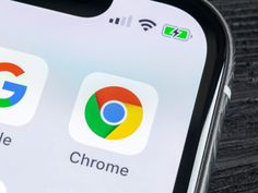 the chrome logo is displayed on an iphone