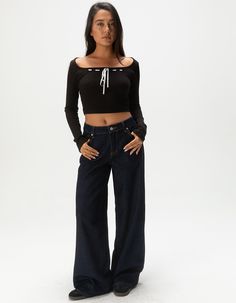 Rsq Mid Rise Wide Leg Jeans. Zip Fly And Button Closure. Belt Loop Waist. Mid Rise. Traditional Five Pocket Styling. Wide Leg. Loose Fit. Dark Wash. Non-Stretch Denim. Approx. Inseam: 31''. 69% Cotton, 27% Polyester, 3% Rayon, 1% Spandex. Machine Wash. Imported. Model Is Wearing A Size 26. Model Measurements:height: 5'7" Bust: 34"waist: 25"hips: 34.5" Low Rise Baggy Jeans, Chino Pants Women, Wwe T Shirts, Flannel Sweatshirt, Chino Jeans, Girls Blouse, Loose Jeans, Low Rise Jeans, Guess Jeans