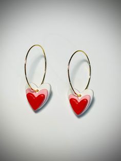 Red, white, and pink hearts on 18k gold plated hoop earrings | Polymer Clay Earrings. Easy to put on (see video!) and secure. Perfect for Valentine's Day, everyday wear, or that special occasion!  Super lightweight, durable, with hypoallergenic 18k gold plated hoops. Gift wrapping available. Each item will be similar, but not identical as all items are handmade with love in Knoxville, TN 🧡 Thank you for supporting my small business! Don't hesitate to reach out to me if you have questions or iss Heart Charm Round Earrings For Valentine's Day, White Pierced Earrings For Valentine's Day, Small Hoop Yellow Gold Earrings For Valentine's Day, Valentine's Day Heart Charm Round Earrings, White Valentine's Day Earrings, Pink Heart Charm Hoop Earrings For Valentine's Day, Pink Hoop Earrings With Heart Charm For Valentine's Day, Hypoallergenic Hoop Earrings For Valentine's Day Anniversary, Small Hoop Heart Earrings For Valentine's Day Gift