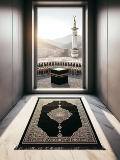 an area rug in front of a window with a view of the dome of the rock