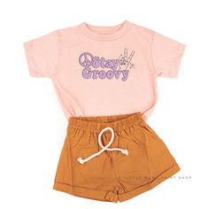 Please reference all size charts before purchasing. Groovy Cotton Tops For Streetwear, Groovy Cotton Tops With Relaxed Fit, Groovy Summer Cotton T-shirt, Groovy Summer Streetwear Tops, Stay Groovy, Retro Kids, Kids Tops, Size Charts, Boho Shorts