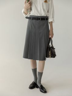 A half skirt with different pleats on the front and back. Pair it with a slender belt to create a classic and fashionable outfit. This item has a sophisticated look and a casual feel. 
 
 
 Size 
 
 
 XS size 
 
 Total length: 61cm 
 Waist: 62cm 
 Hip: 85cm 
 
 S size 
 
 Total length: 62cm 
 Waist: 66cm 
 Hip: 89cm 
 
 M size 
 
 Total length: 63cm 
 Waist: 70cm 
 Hip: 93cm 
 
 L size 
 
 Total length: 64cm 
 Waist: 74cm 
 Hip: 97cm 
 
 
 
 
 
 
 Material 
 
 Polyester 
 Rayon 
 
 
 Model worn Belted Pleated Skirt For Work, Fitted Belted Pleated Skirt For Work, Belted Flared Pleated Skirt For Workwear, Fall Workwear Belted Pleated Skirt, Classic Formal Belted Skirt, Classic Belted Office Skirt, Classic Formal Mini Pleated Skirt, Classic Belted Skirt For Workwear, Elegant Mini Pleated Skirt With Belt Loops