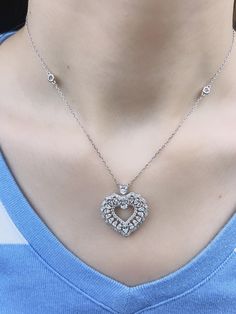 Celebrate love and elegance with our 925 Sterling Silver Heart-Shaped Simulated Diamond Cubic Zirconia Necklace for Women. This enchanting necklace is crafted from high-quality 925 sterling silver, ensuring both durability and a radiant, lasting shine. The centerpiece of this beautiful necklace is a heart-shaped cubic zirconia simulated diamond, expertly cut to reflect and refract light, creating a dazzling sparkle that captures the essence of romance. Perfect for any occasion, this necklace sea Fine Jewelry Heart Necklace With Cubic Zirconia, Fine Jewelry Heart Necklace In Cubic Zirconia, Formal Heart Cut Cubic Zirconia Necklace, Elegant Crystal Heart Necklace For Wedding, Silver Heart Necklace For Wedding, Fine Jewelry, Classic Heart Shaped Cubic Zirconia Jewelry, Classic Heart-shaped Cubic Zirconia Jewelry, Cubic Zirconia Necklace With 17 Jewels For Valentine's Day, Fine Jewelry Heart Necklace With Round Cut Cubic Zirconia