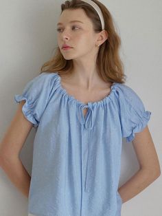 This is a trendy and feminine top by LETTER FROM MOON that is made out of high quality and sturdy material. With distinctive mood of the design and comfortable wear, you can style it for your casual daily outfit.- Lovely flower pattern on the fabric- Adjustable neck string for natural shirring- Feminine and casual mood Chic Floral Print Blouse For Loungewear, Short Sleeve Blouse With Floral Print For Loungewear, Feminine Short Sleeve Blouse For Loungewear, Chic Blouse With Floral Print For Loungewear, Casual Spring Loungewear Blouse, Casual Puff Sleeve Tops For Loungewear, Casual Puff Sleeve Loungewear Tops, Blue Spring Loungewear Blouse, Chic Floral Print Tops For Loungewear