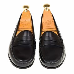 PENNY LOAFERS IN BLACK VARIK Luxury Patent Leather Loafers For Semi-formal Events, Black Dress Shoes With Stitched Sole For Galas, Timeless Black Slip-on Loafers, Elegant Black Tassel Loafers With Stitched Sole, Classic Black Slip-on Moccasins, Classic Black Loafers With Stitched Sole, Closed Toe Loafers With Branded Insole For Galas, Classic Tassel Loafers With Leather Sole And Flat Heel, Black Tassel Loafers With Round Toe For Galas