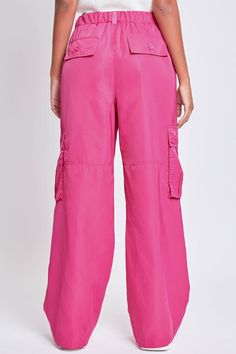 Every day is a new chance to wear our Relaxed Fit Cargo Pants. This high-waisted nylon pant features a relaxed fit for both style and comfort, ensuring you'll look good and feel good throughout the day. Includes classic front pockets, three cargo pockets with button closures, and faux back pockets. Spring Utility Full Length Parachute Pants, Pink Utility Wide Leg Parachute Pants, Pink Wide Leg Utility Parachute Pants, Utility Wide Leg Nylon Bottoms, Pink Wide Leg Utility Pants, Relaxed Fit Wide Leg Nylon Parachute Pants, Baggy Wide Leg Nylon Bottoms, Nylon Wide Leg Cargo Parachute Pants, Summer Wide Leg Nylon Parachute Pants