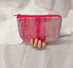 Beautiful multi-colored pouch with pink, teal, and purple. Cactus Tote, Red Flamingo, My Community, Zippered Pouch, Small Organization, Dynamic Design, Purse Pouch, Small Accessories, The Pouch