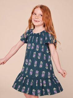 A kid's gotta spin! We went all out on swanky design details for this fun and fancy drop skirt dress with flutter sleeves and scoop elastic neckline. The gorgeous, nature-inspired print takes it to new heights. Created from 100% super-soft cotton jersey. Below mid-thigh length. Playful Floral Print Dress With Flutter Sleeves, Playful Ruffle Sleeve Dress With Floral Print, Playful Floral Print Dress With Ruffle Sleeves, Spring Twirl Dress With Floral Print And Flutter Sleeves, Spring Floral Print Twirl Dress With Flutter Sleeves, Spring Floral Twirl Dress With Flutter Sleeves, Casual Twirl Dress With Ruffle Hem And Flutter Sleeves, Casual Short Sleeve Twirl Dress With Ruffle Hem, Playful Flutter Sleeve Dress With Ruffle Hem