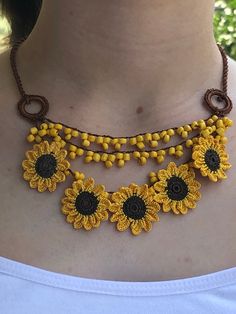 Handmade Bohemian Sunflower Necklace, Turkish Needle Lace Jewelry, Mom Gifts, Traditional Oya ❤️ Beaded Sunflower Necklace is special for women. You can wear this handmade necklace every day. The sunflower necklace will definitely add a stylish finishing touch to your look. You can choose this handmade necklace as a birthday gift or anniversary gift for your mother, wife or girlfriend. If they like beaded jewelry and needlework, this unique handmade necklace is a perfect choice for them. 🎁 Uniq Handmade Flower Necklace For Summer, Handmade Summer Flower Necklace, Yellow Flower-shaped Beaded Necklaces, Yellow Flower-shaped Beaded Necklace, Bohemian Flower Beaded Necklaces For Summer, Bohemian Brown Flower Necklace, Bohemian Flower Necklace For Beach, Bohemian Handmade Flower Jewelry For Beach, Bohemian Beach Flower Necklace