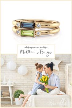 Create your own stacking mother's rings with the baguette birthstone rings. Made with diamond accents in milgrain bezel settings. Perfect Family rings for a growing family. Shown in Yellow gold with peridot and alexandrite Anniversary Diamond Ring With Bezel Setting And May Birthstone, Emerald Bezel Setting Birthstone Ring For Anniversary, Modern Birthstone Diamond Ring For Anniversary, Modern Anniversary Diamond Ring With Birthstone, Diamond Birthstone Ring For Mother's Day, Mother's Day Diamond Birthstone Ring, Mother's Day Yellow Gold Birthstone Ring, Fine Jewelry Birthstone Ring With Bezel Setting For Anniversary, Anniversary Fine Jewelry Birthstone Ring With Bezel Setting