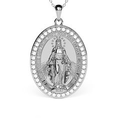 Miracles are within your reach with the Miraculous Medal Virgin Mary Pavé necklace. This necklace features a depiction of the Blessed Mother, with rays emanating from her hands and a halo of stars around her head. Pavé stones around the edges complete this magnificent design. Choose from crystals, lab-grown diamonds, or natural diamonds to make this necklace your own. White Gold Miraculous Medal Round Pendant, Silver Necklace With Miraculous Medal For Wedding, Elegant Sterling Silver Necklace With Miraculous Medal, Elegant Miraculous Medal Jewelry For Gift, Elegant Miraculous Medal Jewelry Gift, White Gold Necklace With Miraculous Medal For Gift, Elegant Miraculous Medal Necklace, White Gold Necklace With Miraculous Medal As Gift, Elegant White Miraculous Medal Jewelry