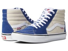 Vans Skate SK8-Hi(r) - Men's Shoes : Navy Peony/Whitecap : Step that shoe game up a notch and skateboard with confidence in the Vans Skate SK8-Hi. These Vans are subtle but make a cool statement as they pair well with just about anything in the wardrobe. Grab that board and make incredible moves in style as these shoes also provide great support for the feet, allowing maximum performance. Cushioning and impact protection helps lessen leg fatigue for longer skate sessions. New molded heel counter Blue Urban High-top Sneakers For Skateboarding, Casual Blue High-top Sneakers For Skateboarding, Trendy Blue Skate Shoes For Skateboarding, Sporty High-top Skateboarding Sneakers With Cushioned Footbed, Sporty High-top Sneakers For Skateboarding With Cushioned Footbed, Vans High-top Sneakers For Skateboarding With Contrast Sole, Vans High-top Sneakers With Contrast Sole For Skateboarding, Trendy High-top Skate Shoes For Skateboarding, Trendy High-top Skate Shoes