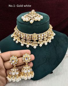 *Light Weight kundan choker necklace set. *Beautiful & Light in weight. *Necklace width: 1.4 inches (included drops) *Earrings length: 2.1 inches  (with drops)   *Stud diameter: 0.8 inches *Earring dome size- 1 inches White Kundan Sets For Celebrations, White Meenakari Party Sets, White Temple Jewelry Style Choker For Celebrations, White Temple Jewelry Choker For Celebrations, White Temple Jewelry Style Choker With Tilla, White Temple Jewelry Choker With Tilla, White Tilla Temple Jewelry Choker, White Meenakari Temple Jewelry Choker, White Temple Jewelry Choker For Festivals