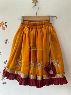 This ethnic lehenga featuring cape sleeve and jerry worked choli and tutu edged skirt accompanied with a sequienced dupatta. Please Visit My Shop For More Unique Collection https://www.etsy.com/shop/Chitralie BUYER'S PLEASE LEAVE YOUR CONTACT NUMBER. It's necessary for shipping. Fabric and Work Choli: Cape sleeve with jerry and sequence embroidered tulle fabric. The choli is lined in soft cotton fabric and ties at the back. The hanging is made with unique fabric flowers. Skirt: Gathered shimmer Anarkali Skirt With Resham Embroidery, Festive Resham Embroidered Traditional Drape Skirt, Festive Traditional Drape Skirt With Resham Embroidery, Festive Resham Embroidery Traditional Drape Skirt, Anarkali Long Skirt With Resham Embroidery, Party Skirt With Resham Embroidery In Traditional Drape, Festive Skirt With Resham Embroidery And Traditional Drape, Festive Resham Embroidered Traditional Skirt, Festive Resham Embroidery Traditional Skirt