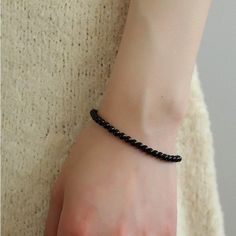 Add a touch of sophistication to your wrist with our Black Onyx Beaded Bracelet—a sleek and versatile accessory that seamlessly blends the timeless beauty of black onyx beads with a minimalist design. Metal: Recycled Sterling Silver Gemstone: Black Onyx 4mm Length: 170mm Weight: 5g Onyx Bead, Black Agate, Summer Clothing, Unique Gemstones, Deep Black, 925 Silver Jewelry, Swarovski Pearls, Keep Jewelry, Smokey Quartz