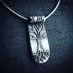 This tree of life has intricate raised roots and branches, supporting our connection to the earth, our ancestors, and our inner wisdom. Piece is fine silver (999), approximately 1.25” long, and hangs on a sterling silver chain. Free shipping on all orders within the USA! International orders flat rate of $8. It takes me approximately 10 days to create and ship your piece, as I hand-make each one. Symbolic Tree Of Life Sterling Silver Jewelry, Symbolic Sterling Silver Tree Of Life Jewelry, Bohemian Silver Jewelry With Tree Of Life, Sterling Silver Tree Of Life Nature-inspired Jewelry, Unique Sterling Silver Tree Of Life Necklace, Spiritual Sterling Silver Jewelry With Tree Of Life, Spiritual Tree Of Life Sterling Silver Necklace, Etched Copper Jewelry, Clay Tree