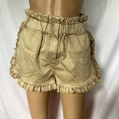 Nwt. Paper Bag Style Waist. Frills On Sides & Hem. Thick Cotton Polyester Elastane Blend With A Distressed Suede Look. Size Small. Length From Waist 15”.Inseam 3”. Waist Laying Flat 13.5”. Trendy Khaki Bottoms For Summer, Trendy Khaki Summer Bottoms, Beige Cotton Paperbag Waist Shorts, Chic High-waisted Khaki Shorts, Chic Beige Shorts For Summer Outings, Brown Bottoms For Summer Day Out, Trendy Khaki Shorts For Summer, Beige Paperbag Waist Summer Bottoms, Beige Paperbag Waist Shorts For Summer