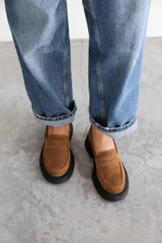 Introducing our  Brown Suede Loafers - a true fashion staple that combines timeless style with utmost comfort. Crafted from supple brown suede, these loafers are designed to elevate your everyday wardrobe effortlessly. The classic penny loafer silhouette adds a touch of sophistication, making them perfect for any occasion - be it dressing up for the office or casual outings with friends. With their versatile color, these brown leather loafers can easily be paired with jeans, dresses, or skirts. Suede Flat Heel Loafers For Everyday, Everyday Suede Loafers With Flat Heel, Brown Suede Slip-ons For Spring, Everyday Suede Loafers With Leather Sole, Casual Brown Suede Slip-ons, Brown Suede Flat Heel Loafers, Brown Suede Loafers With Flat Heel, Brown Suede Moccasins With Brogue Detailing, Everyday Slip-on Suede Loafers