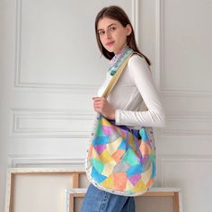 This bag is ideal for those who love bold, artistic accessories that stand out and bring a splash of colour to their outfit. Whether for casual outings, shopping trips, or as a unique gift, this patchwork shoulder bag combines functionality with creative design.  Lining - Yes Pocket - Yes Thickness -Medium Cover: Cotton 100% Digitally Printed Lining : Cotton 100%   Cold Wash (Machine washable) Artistic Summer Tote Shoulder Bag, Trendy Multicolor Hobo Bag Tote, Trendy Multicolor Hobo Tote Bag, Casual Multicolor Hobo Bag For Shopping, Artsy Summer Bags, Artsy Rectangular Summer Bag, Artsy Rectangular Summer Bags, Multicolor Canvas Shoulder Bag For Shopping, Multicolor Satchel Bucket Bag