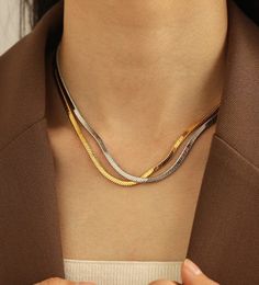 The EMES SHOP necklace details a snake bone flat chain that bends smoothly against your skin. Features an 18K gold plated brass material. Eatonton Georgia, A Snake, Gold Plated Necklace, Brass Material, Shop Necklaces, Your Skin, Bones, Silver Gold, 18k Gold