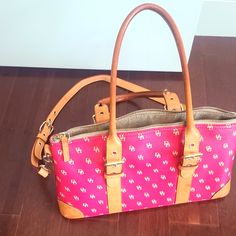 Dooney Tote. Authentic, Hot Pink, Comes With Strap Luxury Pink Coated Canvas Shoulder Bag, Luxury Pink Coated Canvas Bag, Pink Coated Canvas Top Handle Bag, Pink Top Handle Bag In Coated Canvas, Luxury Pink Bags With Leather Handles, Designer Pink Coated Canvas Shoulder Bag, Pink Designer Coated Canvas Shoulder Bag, Designer Pink Coated Canvas Bag, Pink Coated Canvas Bag With Removable Pouch