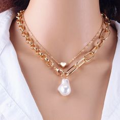 📍 Product Overview: Classy & Timeless: The necklace showcases a pearl, symbolizing purity and elegance. Durable Material: Made of zinc alloy, ensuring longevity and resistance to tarnish. Versatile Design: Suitable for both daily wear and special occasions. Secure Link Chain: The link chain is sturdy and offers a comfortable fit, ensuring the pendant stays in place. Color Options: Choose between classic gold or sleek silver to best match your style. Specifications: Item Type: Pendant Necklace M Pearl Chain Alloy Necklace For Wedding, Wedding Pearl Chain Necklace In Alloy, Alloy Pearl Necklace As A Gift, Gold Alloy Jewelry With Pearl Charm, Alloy Pearl Chain Necklace For Gift, Alloy Pearl Necklace With Clavicle Chain As Gift, Pearl Necklace With Clavicle Chain As Gift, Pearl Chain Necklace In Alloy As Gift, White Alloy Pearl Necklace For Gift