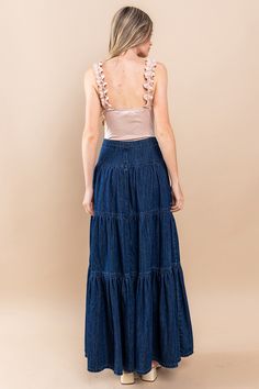 Step out in style with our Boho wide sweep denim skirt. The tiered maxi design adds a touch of elegance, while the side pockets provide convenience. Expertly crafted with quality denim, this skirt is perfect for any occasion. Experience the perfect blend of fashion and function with our Boho denim skirt. Dark Wash Denim Maxi Skirt, Denim High Waist Maxi Skirt, High Waist Denim Maxi Skirt With Relaxed Fit, Chic Fitted Medium Wash Maxi Skirt, Medium Wash Denim Tiered Skirt, Chic Wide Leg Maxi Skirt With Ruffles, Tiered Denim Skirt With Pockets For Summer, Chic Long Denim Skirt For Summer, Spring Dark Wash Wide Leg Maxi Skirt