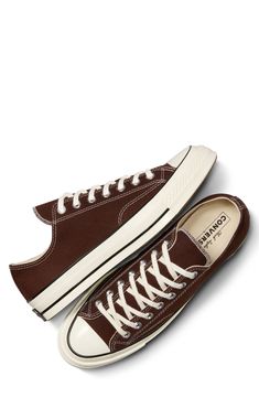 A 1970s icon lives on in an always-cool canvas sneaker that still sports its streamlined profile and glossy rubber cupsole inspired by the iconic original. Lace-up style Removable OrthoLite® insole Textile upper and lining/rubber sole Imported Low Top Brown Converse, Converse 70s Low, Converse Low-top Vintage Sneakers, Converse Low-top Skate Shoes, Low Converse, Converse Low-top Synthetic Sneakers, Dark Roots, Converse Chuck Taylor All Star, Canvas Sneakers