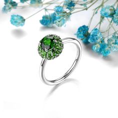 Handcrafted Elegance Indulge in the exquisite craftsmanship of the Elegant 1.7 Carat Natural Chrome Diopside Sterling Silver Ring. This vintage piece showcases a unique design that is both elegant and beautiful, perfect for those who appreciate luxury. High-Quality Materials Made from premium S925 sterling silver, this ring boasts durability and a classic style that complements any outfit. The rich green hues of the natural chrome diopside gemstone add a touch of sophistication, making it a true Green Diamond Ring With Halo, Green Cluster Ring With Halo, Gift Tsavorite Diamond Ring With Halo Setting, Gift Diamond Ring With Tsavorite In Halo Setting, Green Sapphire Ring With Halo Setting For Formal Events, Green Sapphire Ring With Halo Setting For Formal Occasions, Green Halo Design Round Jewelry, Green Halo Design Ring For May Birthstone, Green Sapphire Ring With Sterling Silver