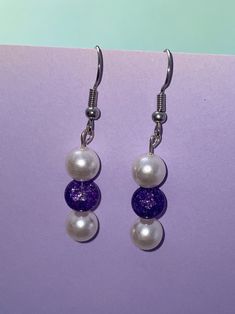 Pearl earrings with purple core. Cute dangle earrings. Purple Single Drop Earring, Single Purple Drop Earring, Purple Pearl Earrings As Gift, Purple Pearl Earrings Gift, Purple Pearl Earrings For Gift, Purple Round Pearl Earrings For Gift, Purple Pearl Earrings For Pierced Ears As A Gift, Nickel-free Purple Beaded Round Earrings, Hypoallergenic Purple Round Earrings