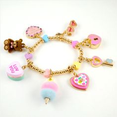 Description Delightful charm bracelet featuring vibrant and whimsical designs, perfect for adding a playful touch to any outfit. Includes a variety of colorful charms such as hearts, keys, and cotton candy, making it a fun accessory for kids. Ideal for gift-giving, birthday parties, and everyday wear, making it a versatile and cherished addition to any jewelry collection. Material & Care Material: High-Quality Enamel and Metal Alloy Care: Wipe clean with a soft cloth, avoid contact with water an Flying Unicorn, Unicorn Charm, Gold Snowflake, Necklace Charms, Charm It, Pink Purse, Candy Making, Cute Charms, Cotton Candy