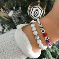 "Brand new to the Louis and Finn shop -- how FUN are these custom beaded name bracelets with colorful letters! All bracelets are a colorful mixture of letter beads as shown. You just pick the color(s) for the band! Use your name, initials, your kiddos, pet names, motivation words, phrases -- options are endless! These also make perfect gifts for -- mamas to be, baby shower, bridal, bachelorette party, best friends, etc. ≫ PRODUCT DETAILS ◈ 1. All letters are capitalized ◈ 2: Use the personalize Casual White Name Bracelet For Personalized Gift, Personalized White Beaded Bracelets With Letter Beads, White Beaded Name Bracelet For Personalized Gift, Personalized White Beaded Name Bracelet, White Stretch Bracelet With Letter Beads For Personalized Gift, Personalized White Stretch Bracelet With Letter Beads, White Beaded Bracelets With Letter Beads For Personalized Gift, White Casual Name Bracelet For Personalized Gift, Customized White Beaded Bracelets For Everyday