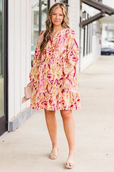 This vibrant pink dress features long-sleeves, a flowy ruffle design, and a smocked waistline for a flattering fit! The v-neckline adds a touch of elegance, while the abstract floral design in shades of pink and orange bring a pop of color to any occasion! This piece is perfect for making a statement and standing out from the crowd! Self - 97% Polyester, 3% ElastaneLining - 100% Polyester Shades Of Pink And Orange, Standing Out From The Crowd, Abstract Floral Design, Ruffle Design, Tunic Sweatshirt, Jumpsuit Party, Planting Seeds, Fall Shopping, Dress With Cardigan