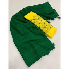 Green colored saree is made from georgette fabric which is highlighted with beautiful zari weaving work as shown. comes along with unstitched embroidered georgette blouse which you can customise as per your design/style. Occasion - You can wear this saree for festive and functions, outing and get-together. Note:- the actual product may differ slightly in color and design from the one illustrated in the images when compared with computer or mobile screen. Measurements: Saree : Georgette : 5.5 Mtr Designer Green Sharara With Embroidered Border, Green Sharara With Embroidered Border For Navratri, Designer Wear Green Sharara With Embroidered Border, Green Sharara With Embroidered Border For Diwali, Green Semi-stitched Sharara With Embroidered Border, Semi-stitched Green Sharara With Embroidered Border, Bollywood Style Green Sharara With Embroidered Border, Navratri Green Georgette Blouse Piece, Green Georgette Blouse Piece For Navratri