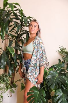 This flattering lightweight versatile floral cuteness is the perfect casual coverup for summer outings. Just pop a bathing suit and a straw sunhat, and you're ready to go! #lovemyleto 100% Viscose Imported Bohemian Lightweight Cover-up For Day Out, Cotton Beach Cover-up For Beach Season, Cotton Beachwear Cover-up For Day Out, Beachy Cotton Cover-up For Vacation, Summer Cotton Cover-up For Vacation, Cotton Beach Season Cover-up For Vacation, Beach Season Cotton Cover-up For Vacation, Floral Print Open Front Cover-up For Vacation, Lightweight Cover-up For Beach Season