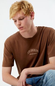 Elevate your streetwear with the Los Angeles Embroidered Vintage Wash T-Shirt from PacSun. Featuring a classic crew neckline and short sleeves, this tee offers a standard fit for effortless style. The front embroidery adds a touch of retro flair, while the vintage wash gives it a worn-in look and feel that's perfect for casual vibes.


	Crew neckline
	Short sleeves
	Standard fit
	Embroidery on the front
	Vintage wash
	Machine washable
	100% Cotton
	Model is wearing size medium
	Model Measurements: 6’3”  Height, 28” Waist, 33.5” Hips Crew Neck Top With Embroidered Logo In Relaxed Fit, Streetwear Tops With Embroidered Logo And Relaxed Fit, Relaxed Fit Tops With Embroidered Logo For Streetwear, College Embroidered Logo T-shirt With Short Sleeves, College Crew Neck T-shirt With Embroidered Logo, Short Sleeve T-shirt With Embroidered Graphics For College, College T-shirt With Embroidered Graphics And Relaxed Fit, Casual Streetwear Tops With Embroidered Graphics, Casual Tops With Embroidered Graphics For Streetwear