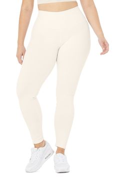 An on-trend high waistline on our classic Airbrush legging. Spotted on basically every it-girl, the High-Waist Airbrush Legging has an on-trend rise and all the best assets of the classic version, like no side seams and a yogi-tested fit that lifts and sculpts. Sculpts, smooths & lifts! No side seams & flat-locked seams for extra comfort Designed & uniquely fit to flatter every size Wear-tested by our in-house team for the perfect fit Alo Yoga® | High-Waist Airbrush Legging in Ivory, White Activewear Bottoms For Light Exercise, Functional White Bottoms For Light Exercise, Cream Sporty Activewear For Sports, Alo Yoga Sporty Activewear With Comfort Waistband, White Alo Yoga Activewear For The Gym, Versatile White Moisture-wicking Bottoms, Cream Stretch Activewear For Sports, White Activewear With Comfort Waistband For Workout, White Sporty Alo Yoga Activewear