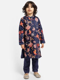 Navy Printed Kurta with Pyjama (Set of 2) Now is the perfect moment to stand out in elegant kurtas! Select a fashionable kurta made from luxurious material cotton, adorned with classic patterns and designs. Match it with cozy pajamas. Your flawless style will surely capture everyone's attention! Age Group: 8-9 years                       9-10 years                       10-11 years                       11-12 years Material- Cotton Pattern- Printed Type of work- Printed Care Instructions- Dry Clean Pack contains- 1 Kurta, 1 Pyjama Diwali Cotton Silk Kurta With Floral Print, Diwali Cotton Silk Floral Print Kurta, Diwali Floral Cotton Silk Kurta, Cotton Bandhgala With Printed Motifs For Festive Occasions, Festive Cotton Bandhgala With Chikankari Embroidery, Blue Cotton Bandhgala With Zari Work, Cotton Silk Kurta With Printed Motifs For Eid, Cotton Bandhgala With Resham Embroidery Long Sleeve, Traditional Bandhgala With Long Sleeves And Printed Motifs