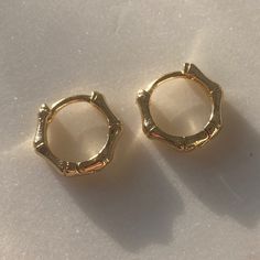 Treat yourself to our Lexi Huggies and show off your care-free style with these comfy earrings. Crafted with gold-filled materials, these babies will hug your lobes with love and style so you can enjoy effortless chic without any of the fuss. Metal: 18k Gold filled 13 mm diameter x 2 mm wide Clicker type closure Hypoallergenic, nickel free, and safe for sensitive skin Hug You, Effortless Chic, Gold Filled, 18k Gold, Gold