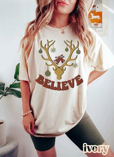 Comfort Colors Believe Christmas Shirt Christmas Believe - Etsy Valentine's Day Celebration, Shirt Inspiration, Comfort Colors Tshirt, Botanical Shirt, Halloween Nurse, Mama T Shirt, Mama Shirts, Tshirt Ideas, Fleetwood Mac