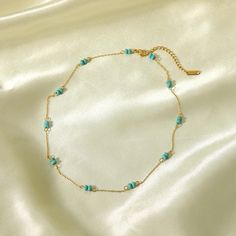 Add a touch of sophistication to your everyday ensemble with our brilliantly designed Gold Plated Beaded Necklace, showcasing a stunning beaded detail. The necklace is lavishly plated with 18K Gold, giving it a luxurious feel combined with enduring durability. Elegant Round Beads Crystal Necklace With Clavicle Chain, Elegant Crystal Necklaces With Round Beads And Clavicle Chain, Elegant Turquoise Necklaces With Polished Beads, Elegant Choker With Polished Beads For Gift, Elegant Gold Plated Beaded Necklaces With Round Beads, Elegant Gold Plated Round Beaded Necklaces, Elegant Gold-plated Round Beaded Necklaces, Elegant Gold Beaded Crystal Necklaces, Gold Crystal Necklaces With Beaded Chain And Round Beads