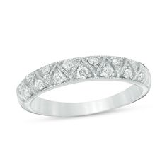 a white gold wedding band with diamonds