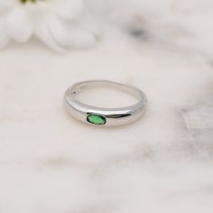 Elegant dome ring with a minimalist emerald center stone is the perfect statement piece. It's dainty and pairs well with other rings. D E T A I L S ▫︎ Made of High Quality 925 Sterling Silver ▫︎ Finish: Thick Plating of 14k Gold or Rhodium ▫︎ Dimensions: 4.5 mm in Height ▫︎ Available in Sizes 4 - 10 ▫︎ Made with the highest grade of cubic zirconia stone for an authentic look ▫︎ Also available in White CZ center stone https://www.etsy.com/listing/876281908/minimalist-dome-ring-gold-ring-chunky?ga Classic Green Rings For Everyday Wear, Classic Green Rings For Everyday, Classic Everyday Green Rings, Modern Emerald Ring With Bezel Setting For Promise, Green Minimalist Signet Ring For Anniversary, Minimalist Green Signet Ring, Modern Green Rings For Everyday Wear, Modern Green Emerald Promise Ring, Modern Everyday Emerald Ring