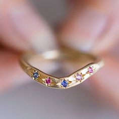 Our Hidden Treasure collection is full of perfectly imperfect pieces cast in raw gold and silver with hidden sapphires and diamonds half exposed. Each piece is a one of a kind. This Celestial Hidden Treasure Band is set with shades of pink and blue sapphires. Band width 2.6mm-2.8mm. Weight 4g approx. Pictured with a matte finish. For a high shine finish please leave a note at checkout. Raw Gold, Hidden Treasure, Pink Sapphire Ring, Pink Ring, Shades Of Pink, Instagram Icons, Perfectly Imperfect, Blue And Pink, Pitcairn Islands